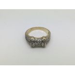 An 18ct gold diamond cluster ring, approx 4.5g and approx size P.
