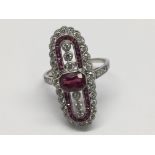 A platinum elongated ring set with rubies 0.97ct a