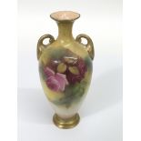 A Royal Worcester small vase painted with roses.Approx 15cm, restored.