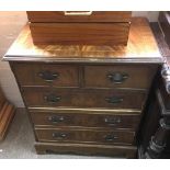 Two small walnut chests of drawers