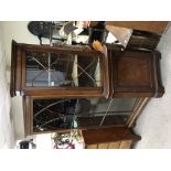 A mahogany corner display cabinet