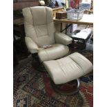 A cream coloured Ekornes stressless leather chair and foot stool.