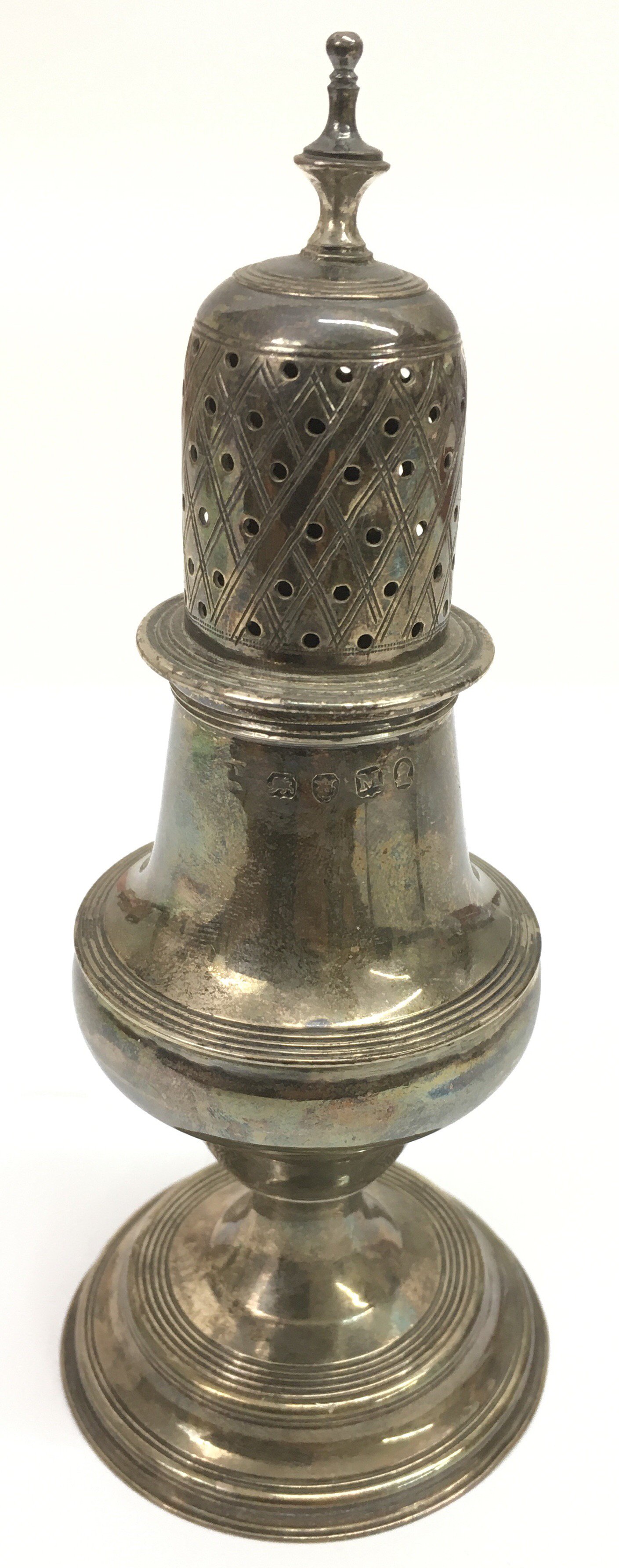 A Georgian silver sifter, bearing London hallmarks