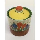 A Clarice Cliff 'Crocus' pattern preserve pot.Approx 11cm, possible matched lid, overpainted.