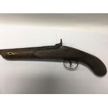 A 19th century flint lock pistol