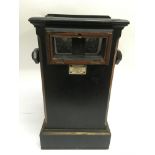 A Negretti & Zambia glass slide viewer counting some original rotating slides.Approx 24x26x44cm