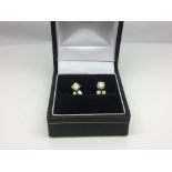 A pair of white gold diamond stud earrings, approx .35ct and approx 1.5g.