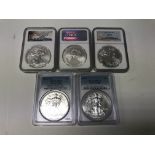 A group of five silver US dollars from 2014