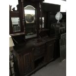 A Victorian walnut mirror backed dresser. 223 x 136cm