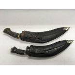 Two Kukhri knives.