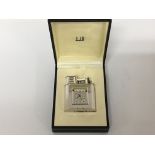 A limited Edition Dunhill lighter based on an early 1930 design limited Edition 0145/1931. With an