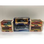 Six boxed Corgi die cast Ford Sierras.