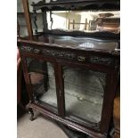 A Edwardian mahogany mirrored back display cabinet