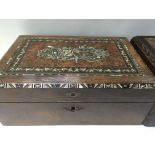 A Victorian writing box with inlaid top and a sewing box .