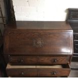 A large oak bureau.Approx 26x90x100cm high