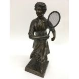 A signed Rulpony bronze of a female Edwardian tennis player.Approx 40cm