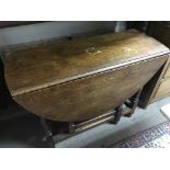 A oak drop leaf table