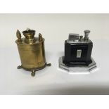 An Early 20th century brass table lighter of neoclassical design with paw feet and an Art Deco Crome