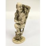 A late 19th century, carved Japanese ivory figure