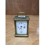 An enamelled face 4 glass brass striking carriage clock
