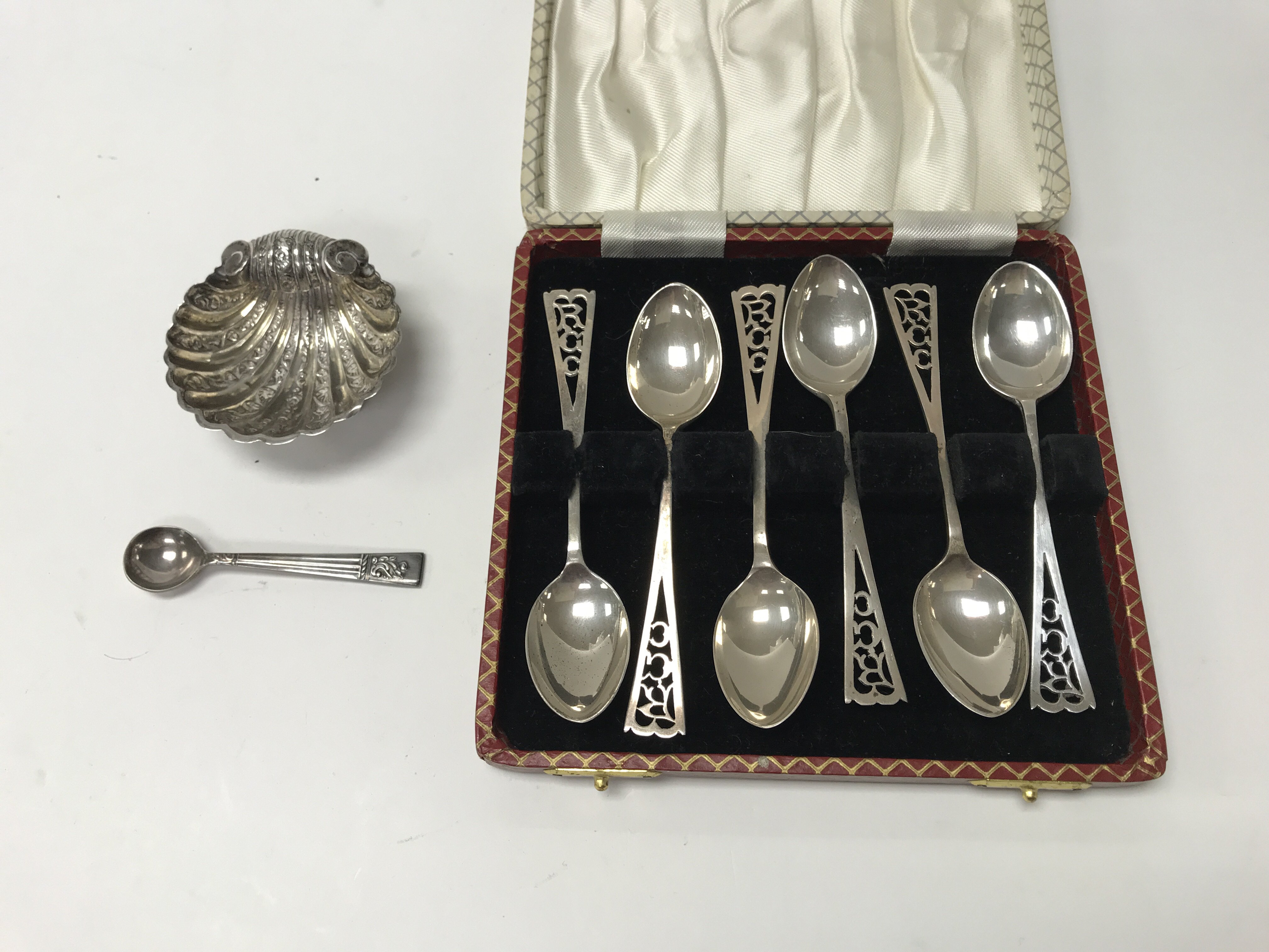 A set of silver spoons, a silver salt dish and EPN