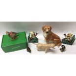 A boxed Beswick partridge, a Doulton dog and other animal models