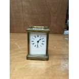 A brass four glass carriage clock (face a/f)