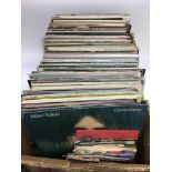 A collection of LPs and 7inch singles by various artists including Simon & Garfunkel, Mike