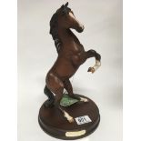 A Royal Doulton horse “Spirit of the Horse” on woo