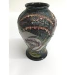 A Moorcroft 'Gypsy' pattern vase of baluster shape, dated '99..Approx 17cm. No damage or crazing