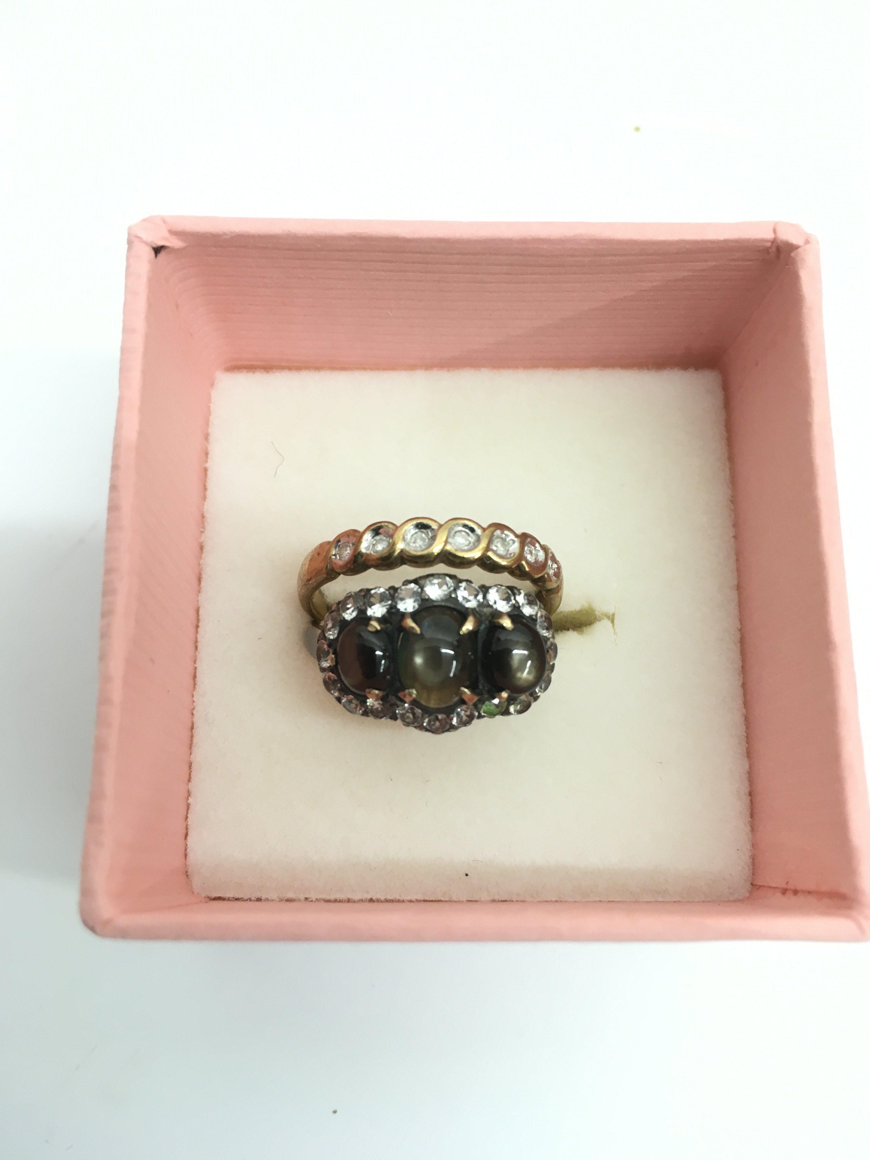 Two gold stone set rings.Approx 5g