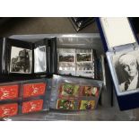 A box of postcards, playing cards, photographs of trains, books etc.