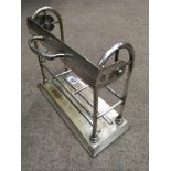 A Victorian silver plated tantalus stand only. No decanters, Betgemanns Patent