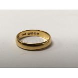 A 22 ct gold wedding band 3.5 grams approx