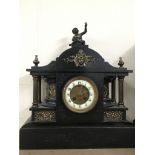 A large , T.Russell, black slate mantle clock of C