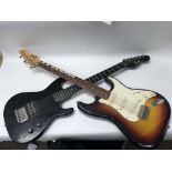 A group of guitar equipment to include two electric guitars by Encore and Rockwood, a Piggy by