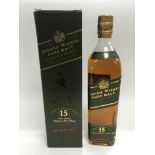 A boxed 700ml bottle of pure malt Johnnie Walker.