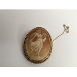 A 9ct gold, carved cameo brooch decorated with a m