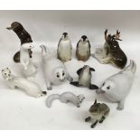 A group of Russian Lomonosov porcelain artic animal models.Damage to one large seal and otter