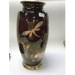A Carlton ware vase decorated with dragonfly flowe