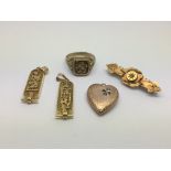A small collection of gold and yellow metal items
