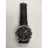 A gents Bulova chronograph watch with a black dial