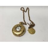 A 18 ct gold half hunter button wind pocket watch with attached 9 ct chain and guinea , watch