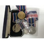 2 National service medals together with a miniatur