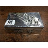A Japanese silver cigarette box with orchid decora