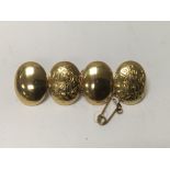 A 18 ct gold four button brooch 14 grams approx