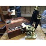 A cased R&J Beck brass microscope model 7970 with