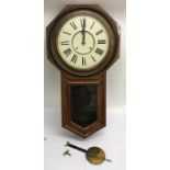 A USA Ansonia wall clock with pendulum and key - N