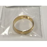 A 22ct gold wedding band. 2.6g.