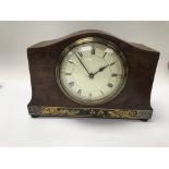 A small bur walnut mantle clock the dial with Roma